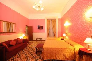 Łóżko lub łóżka w pokoju w obiekcie Hotel Sweet Home