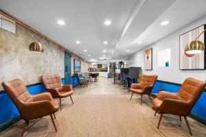 Posezení v ubytování Nine20 Collins Apartments by Lowkl