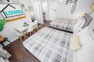 Postel nebo postele na pokoji v ubytování Nine20 Collins Apartments by Lowkl