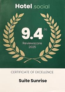 Πιστοποιητικό, βραβείο, πινακίδα ή έγγραφο που προβάλλεται στο Suite Sunrise