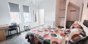 Ένα ή περισσότερα κρεβάτια σε δωμάτιο στο The Burford Hideaway