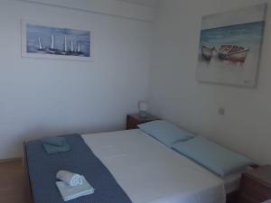 Posteľ alebo postele v izbe v ubytovaní Apartment Ruzmarin