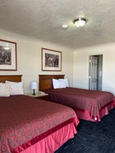 Postel nebo postele na pokoji v ubytování Travelodge by Wyndham Gallup