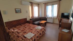 Postel nebo postele na pokoji v ubytování Medic Hotel + 49 fotografií