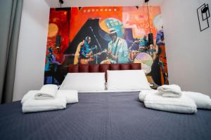 Four Points Suites客房内的一张或多张床位