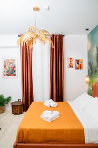 Four Points Suites客房内的一张或多张床位