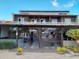 Photo de la galerie de l'établissement Pousada Porto di Mare, à São Pedro da Aldeia