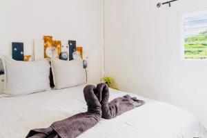Voodi või voodid majutusasutuse Lodge le tamarinier toas