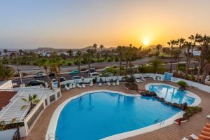 Swimmingpoolen hos eller tæt på Amarilla Golf Apartment