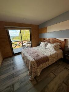 Postel nebo postele na pokoji v ubytování Cabañas Terra Palafito
