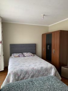 Ένα ή περισσότερα κρεβάτια σε δωμάτιο στο Comfortable Appartment with Optional Parking +20 φωτογραφίες