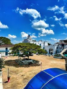 Photo de la galerie de l'établissement Hotel Santorini Aldea Doradal, à Puerto Triunfo 4 autres photos