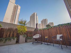 ภาพในคลังภาพของ Xiangyang Station Minfa World City Yishang Plus Hotel ในเซียงหยาง