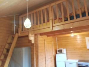 Kuchyň nebo kuchyňský kout v ubytování chalet le cocon de bois