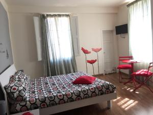 Posteľ alebo postele v izbe v ubytovaní L'Iris B&B