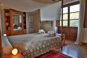 Postel nebo postele na pokoji v ubytování Casa Balata Farm House