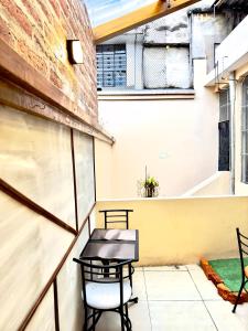 Balkón nebo terasa v ubytování Travel Hotel Quito