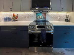 Kuchyň nebo kuchyňský kout v ubytování Sqc Cedar St Cottage