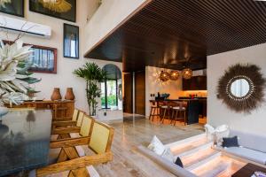 Posezení v ubytování Trobbu Boutique Collection Tulum