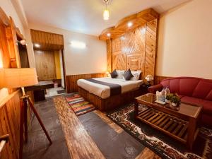 Postelja oz. postelje v sobi nastanitve The Four Season Hotel & Resort, Manali - A blissful view from rooms