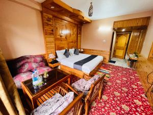 Postelja oz. postelje v sobi nastanitve The Four Season Hotel & Resort, Manali - A blissful view from rooms