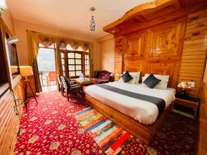 Postelja oz. postelje v sobi nastanitve The Four Season Hotel & Resort, Manali - A blissful view from rooms
