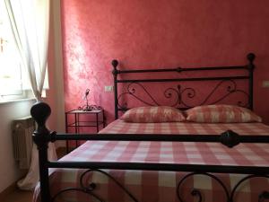 Posteľ alebo postele v izbe v ubytovaní L'Iris B&B