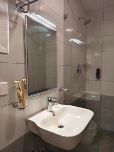 Koupelna v ubytování Hotel Aura by Woco Stays