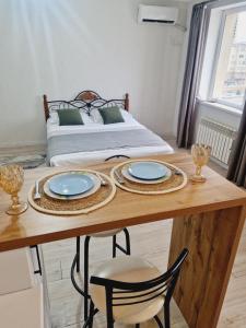 Postel nebo postele na pokoji v ubytování 17 мкр 90 дом