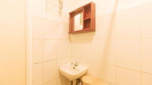 Koupelna v ubytování RedDoorz at City Stay Inns Marilao + 29 fotografií
