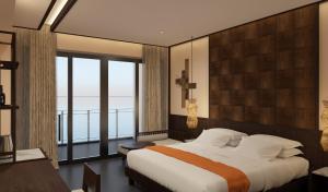 Кровать или кровати в номере Amiana Resort Cam Ranh