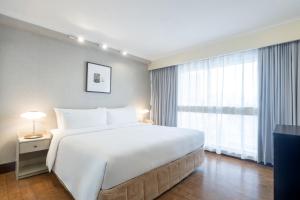 Voodi või voodid majutusasutuse Holiday Inn Golden Mile by IHG toas