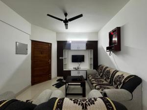 TV a/nebo společenská místnost v ubytování Anvy Pearl suites