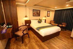 Letto o letti in una camera di Harsha Boutique Hotel
