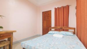 Voodi või voodid majutusasutuse Bello Vue Apartelle toas