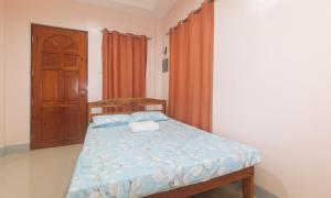 Voodi või voodid majutusasutuse Bello Vue Apartelle toas