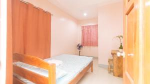 Voodi või voodid majutusasutuse Bello Vue Apartelle toas