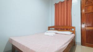 Voodi või voodid majutusasutuse Bello Vue Apartelle toas