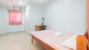 Voodi või voodid majutusasutuse Bello Vue Apartelle toas