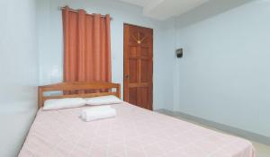 Voodi või voodid majutusasutuse Bello Vue Apartelle toas