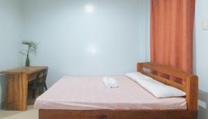 Voodi või voodid majutusasutuse Bello Vue Apartelle toas