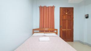 Voodi või voodid majutusasutuse Bello Vue Apartelle toas