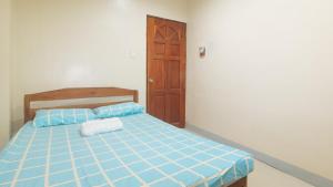 Voodi või voodid majutusasutuse Bello Vue Apartelle toas