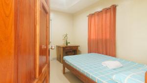 Voodi või voodid majutusasutuse Bello Vue Apartelle toas