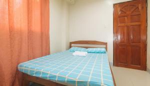 Voodi või voodid majutusasutuse Bello Vue Apartelle toas
