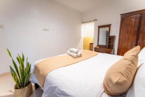 Postel nebo postele na pokoji v ubytování Tendan Residence