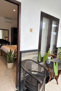 Posezení v ubytování Tendan Residence