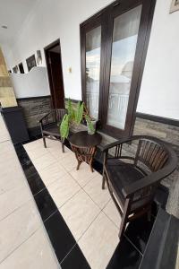 Posezení v ubytování Tendan Residence
