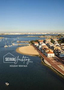 an aerial view of a harbor with boats in the water at Seixal Yachting Bay Original in Seixal