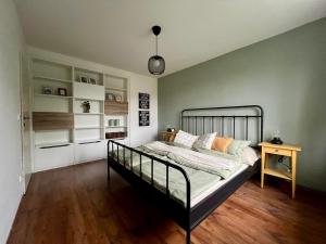 Voodi või voodid majutusasutuse Apartmán Půda na jihu toas